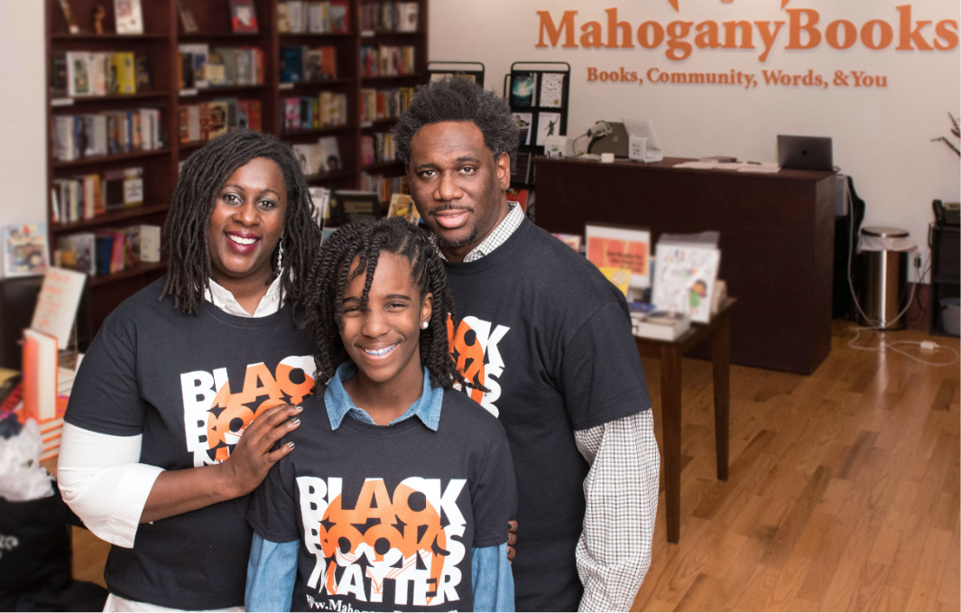 Owners of MahoganyBooks in their book store